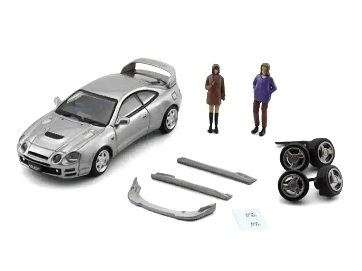 Toyota Celica GT-Four RHD (Right Hand Drive) ID Silver Metallic with 2 Figures and Accessories 1/64 Diecast Model Car by BM Creations Cartsfy Inc.