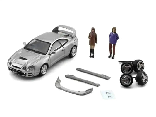 Toyota Celica GT-Four RHD (Right Hand Drive) ID Silver Metallic with 2 Figures and Accessories 1/64 Diecast Model Car by BM Creations Cartsfy Inc.