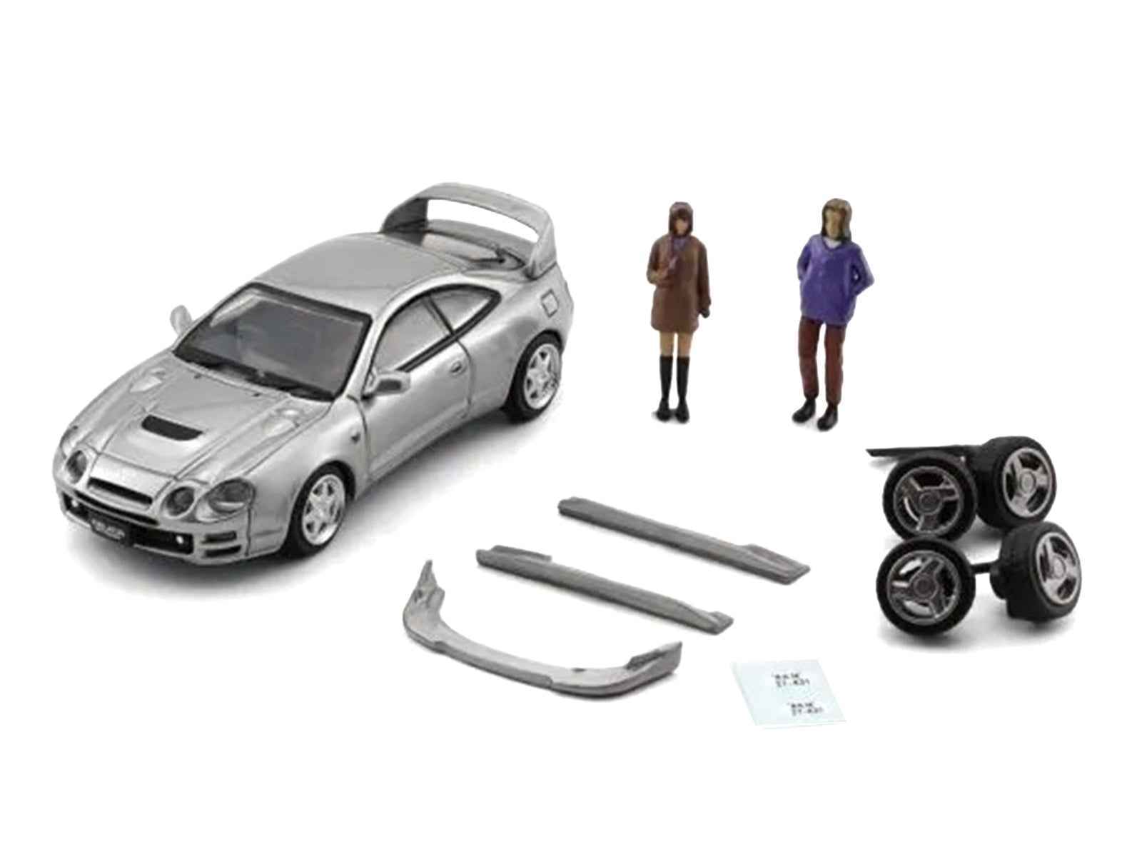 Toyota Celica GT-Four RHD (Right Hand Drive) ID Silver Metallic with 2 Figures and Accessories 1/64 Diecast Model Car by BM Creations Cartsfy Inc.