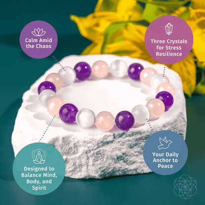 Beaded bracelet on a white stone pedestal with pink, white, and purple stones.