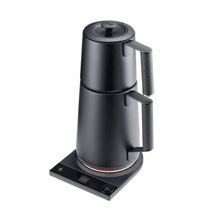 Matte black electric Turkish tea maker on a flat base with mesh side handles