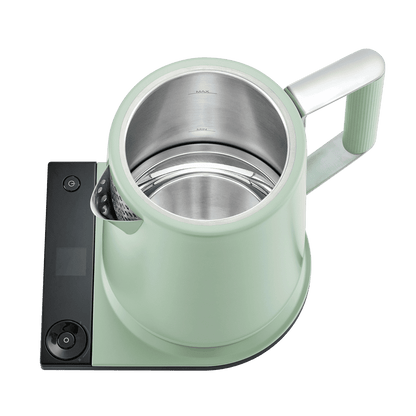 Sage green Turkish tea maker with open inner pot and stainless steel basin
