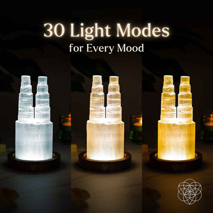Two-tower selenite lamp shown in white and warm light modes