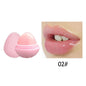 Light pink lip butter balm container with open cap and lips swatch inset