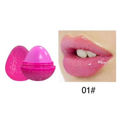 Pink lip butter balm container with open cap and lips swatch inset