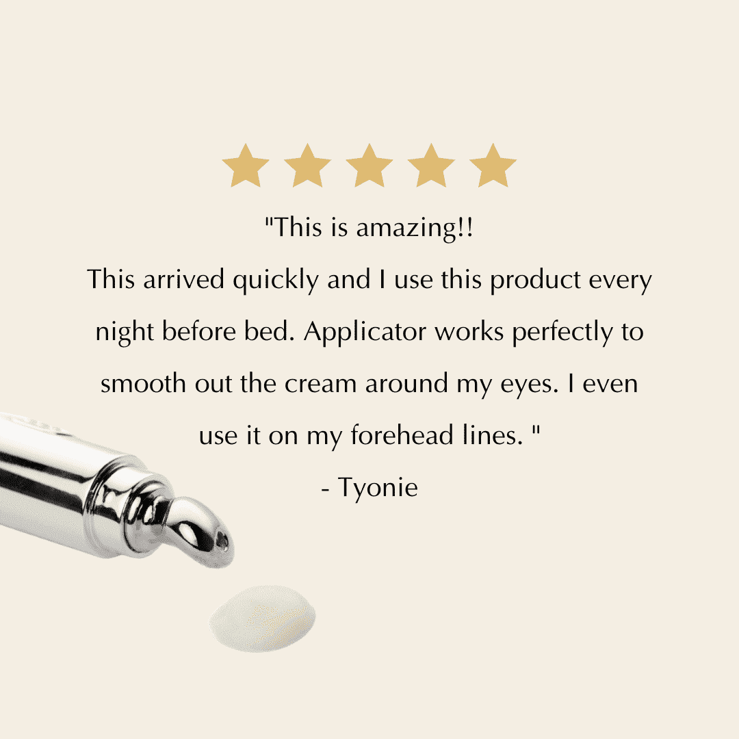 Eye cream tube with chrome roller applicator and a small dab of pale cream