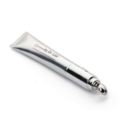 Eye cream tube with chrome roller applicator end and white cream tube body