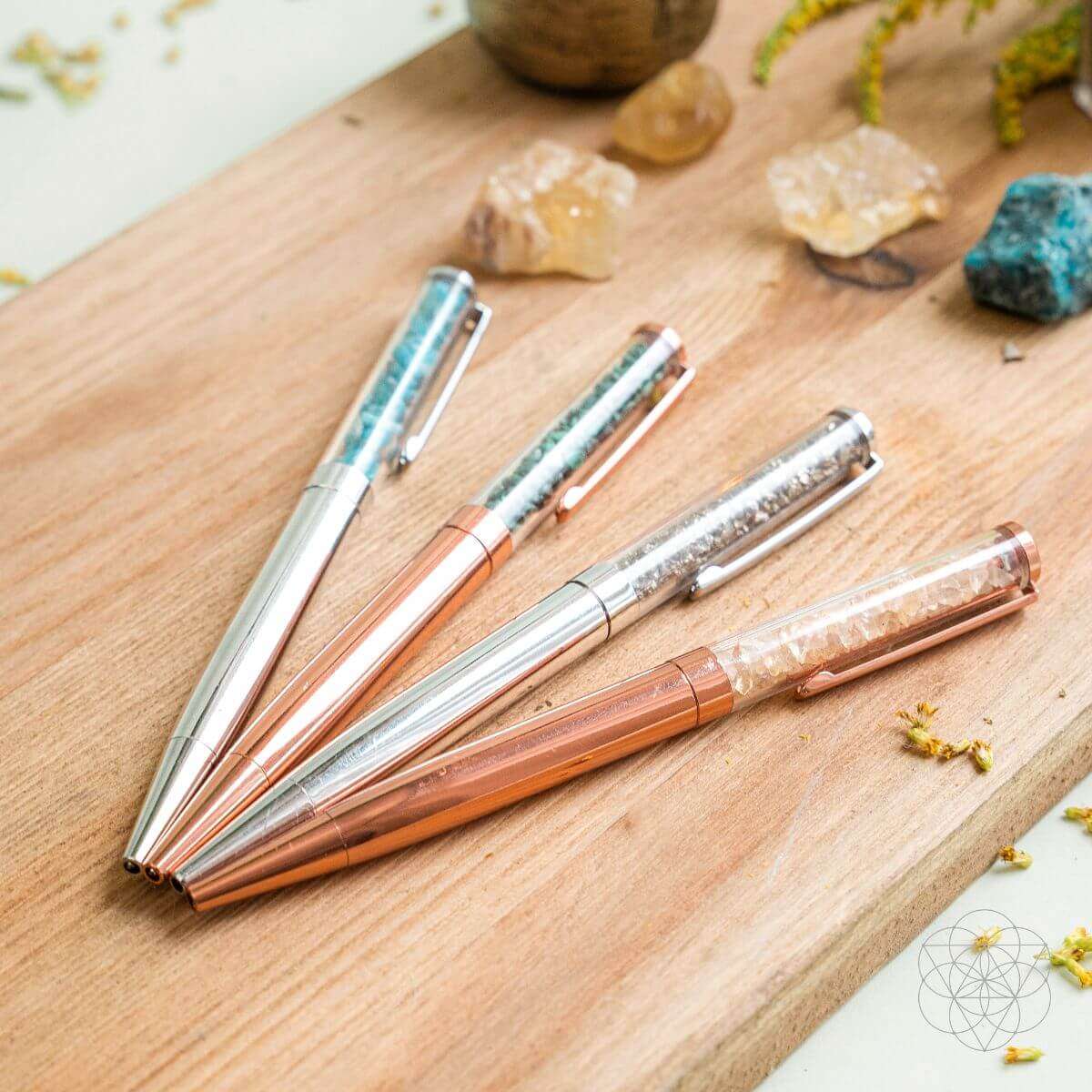 Manifestation pen set with five pens featuring metallic and glitter barrel finishes