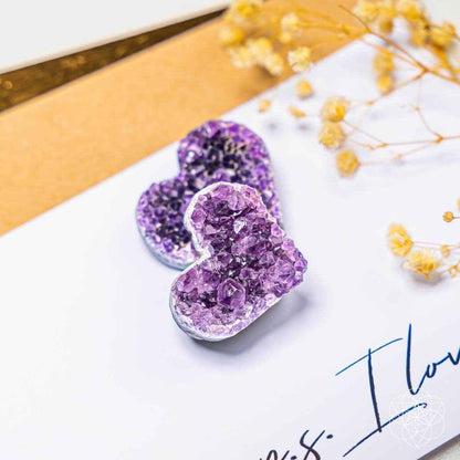 Purple amethyst heart cluster with crystalline druzy center, viewed from above.