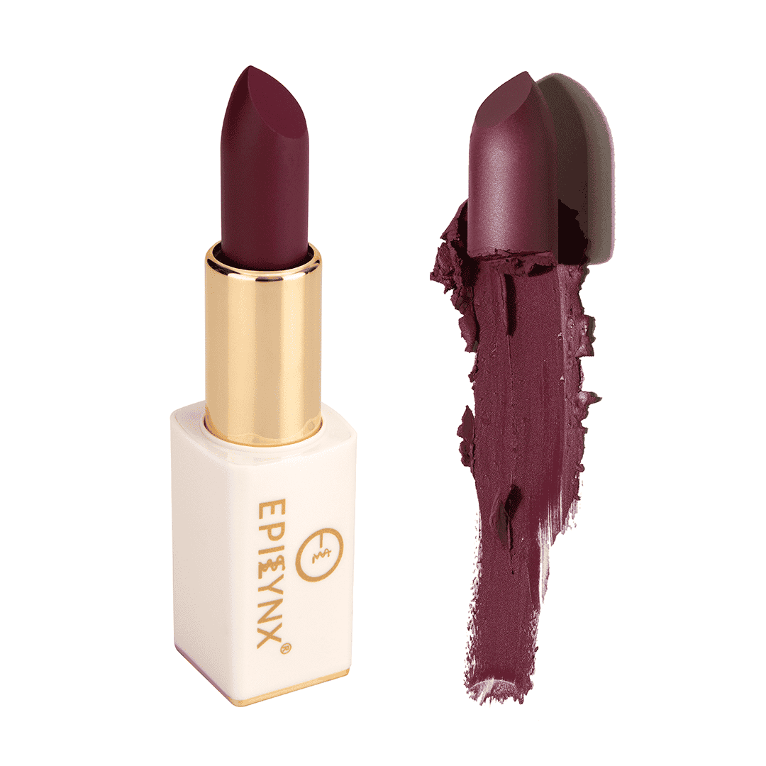 Plum lipstick with gold bullet, white case, and deep berry swatch