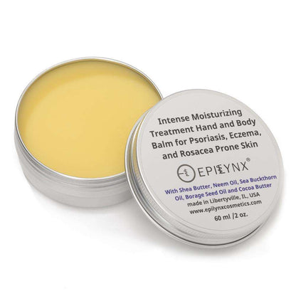 Intense moisturizing hand and body balm in a silver tin with yellow balm inside