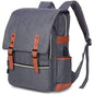 Vintage laptop backpack in gray with brown leather-style straps and flap front pocket
