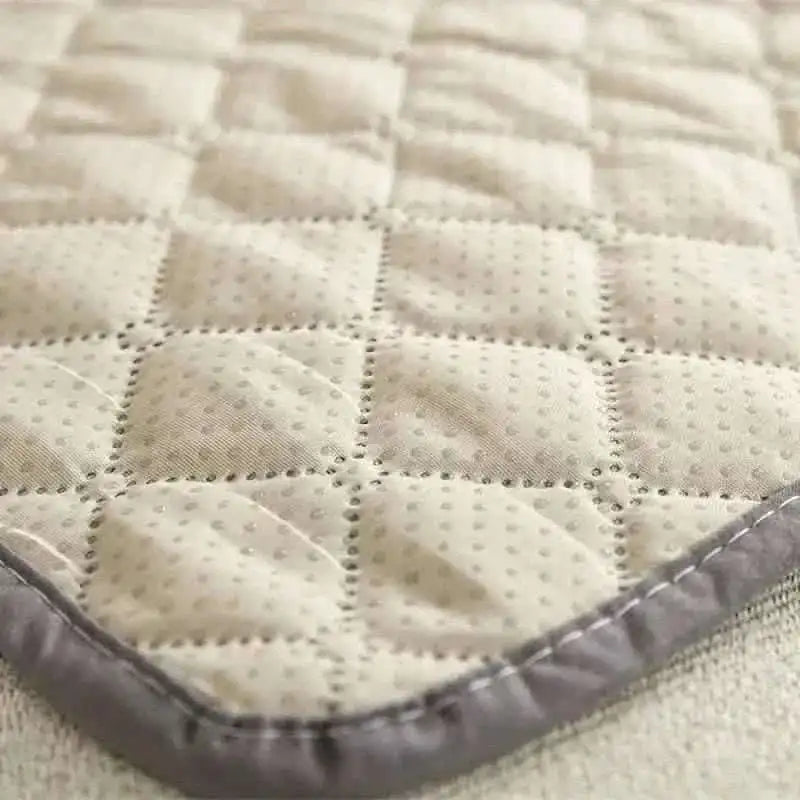 Pet bed cover, cream quilted blanket with stitched edge border