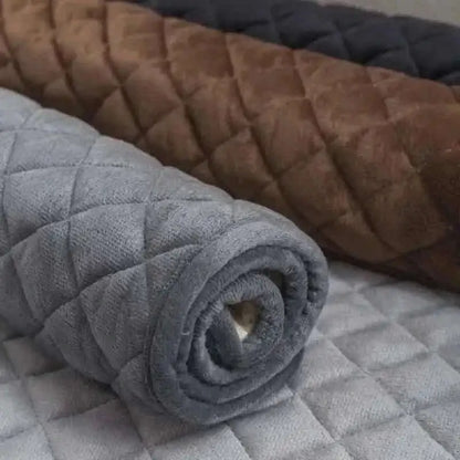 Pet bed cover, folded light gray quilted fabric with plush padding