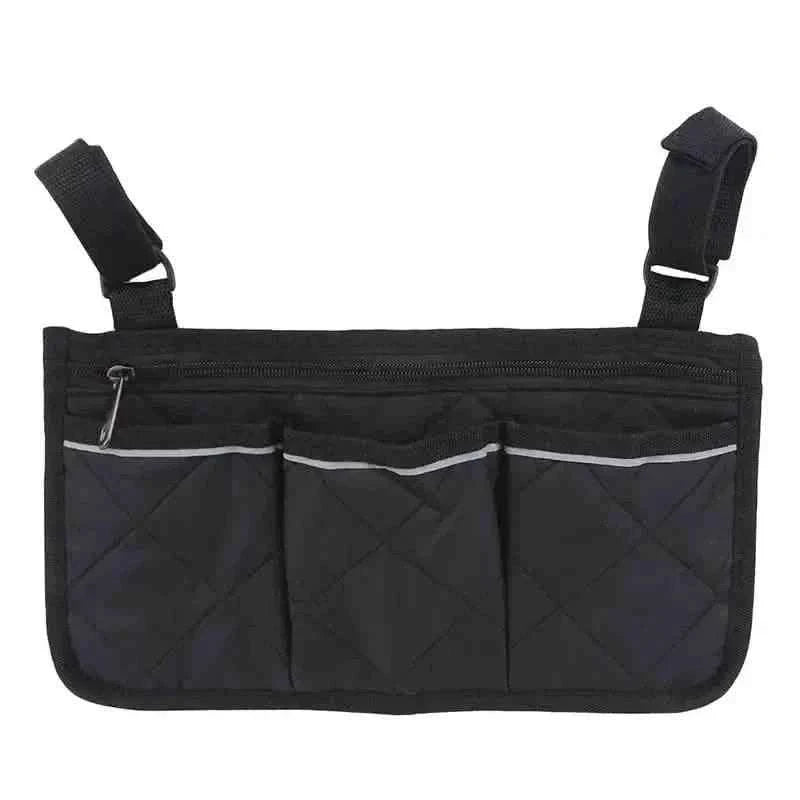 Black wheelchair armrest organizer bag with three pocket panels and top zipper.