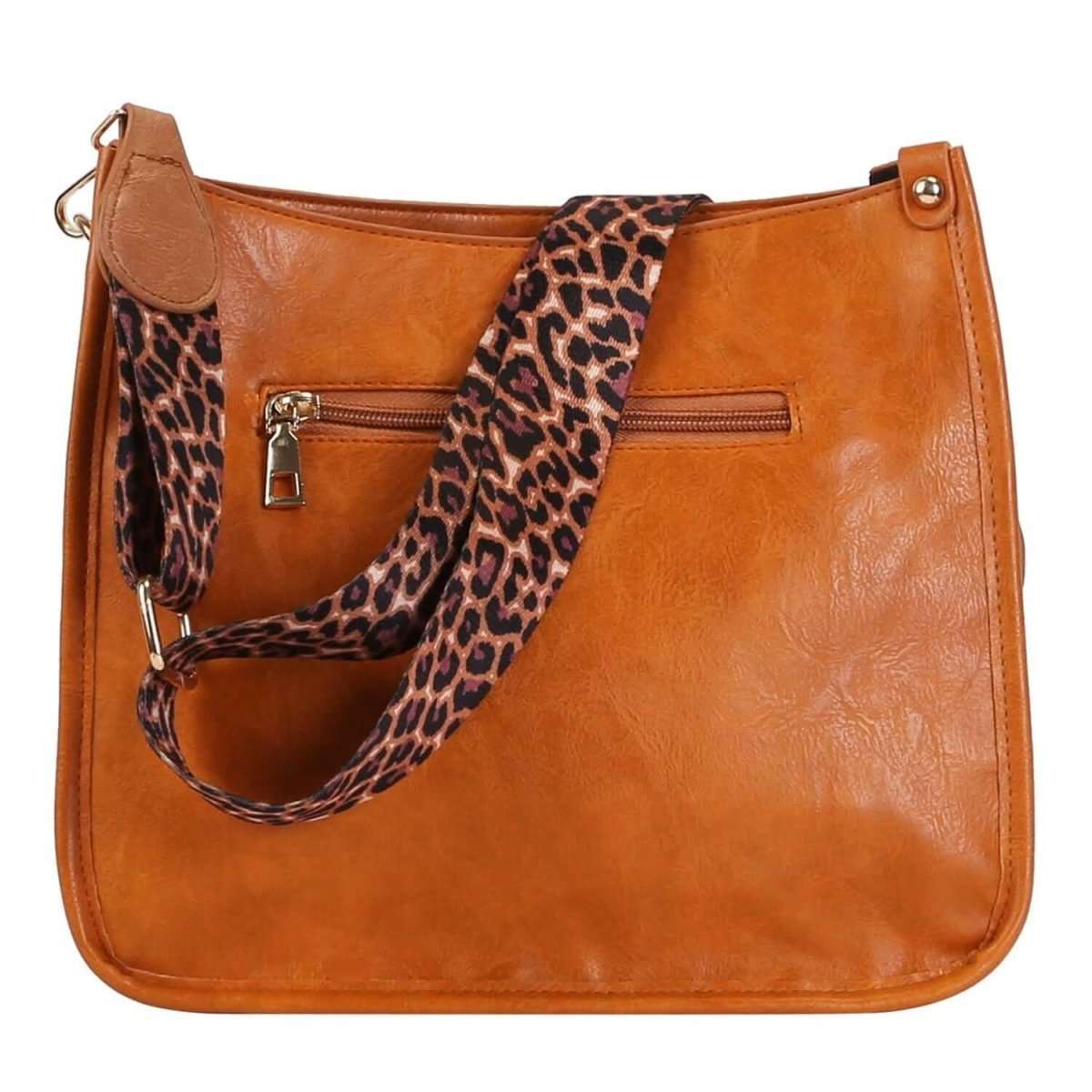Tan leather crossbody bag with leopard-print strap and front zipper pocket