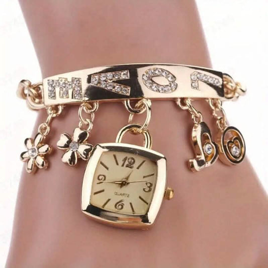 Gold square-face charm bracelet watch with crystal letter links, heart and flower charms