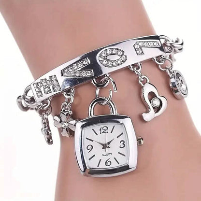 Silver tone charm bracelet watch with square face, crystal letter links and flower charms