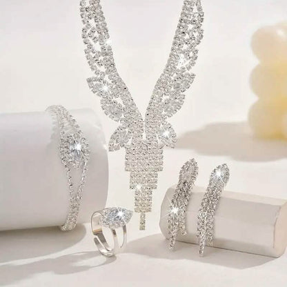 Rhinestone V-neck necklace with hoop earrings and matching ring