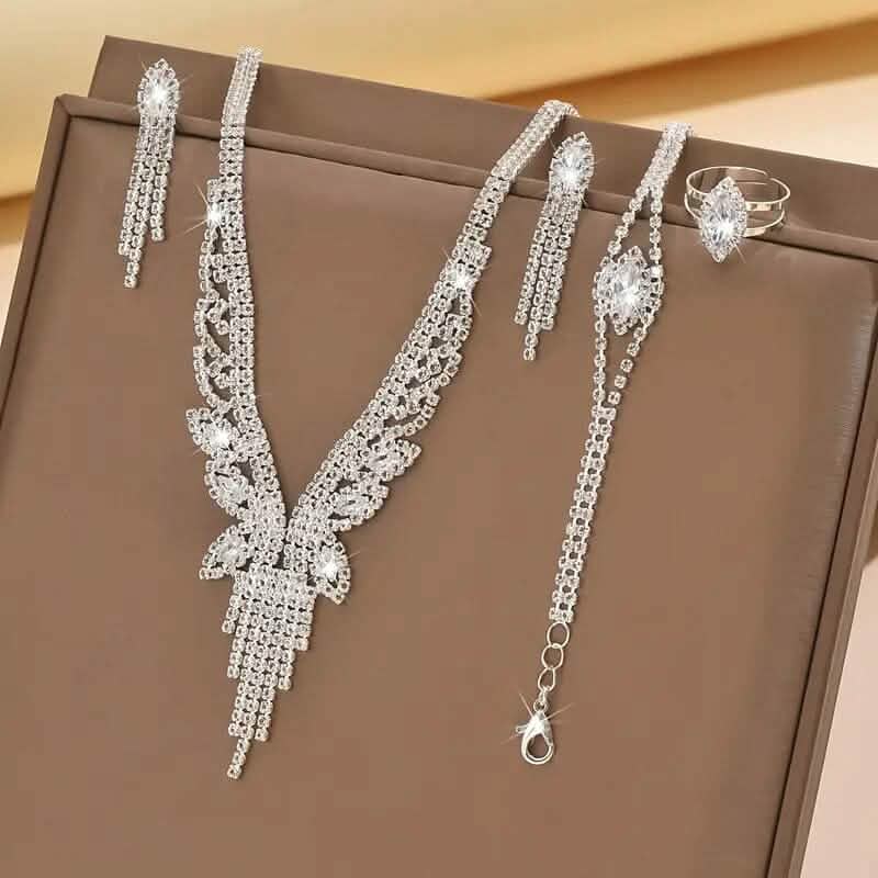 Rhinestone jewelry set in gift box: V-neck necklace, earrings, bracelet, and ring