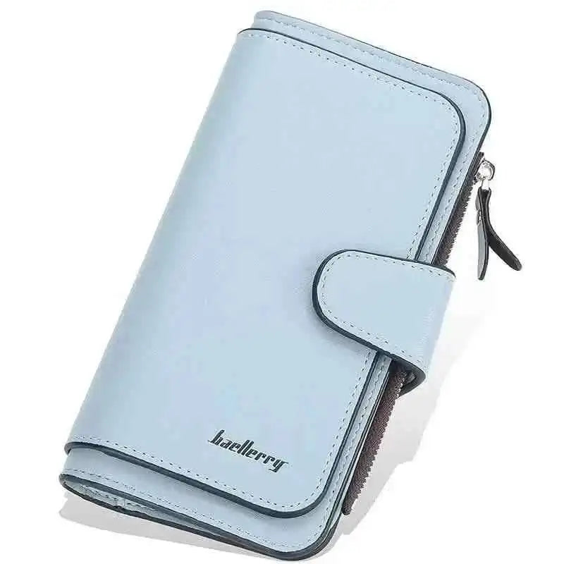 Light blue faux leather wallet with fold-over tab, card slots, and zipper pocket