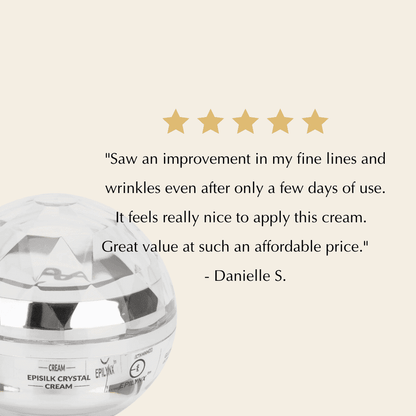 Face cream jar with open lid and pale pink gel-cream swirl